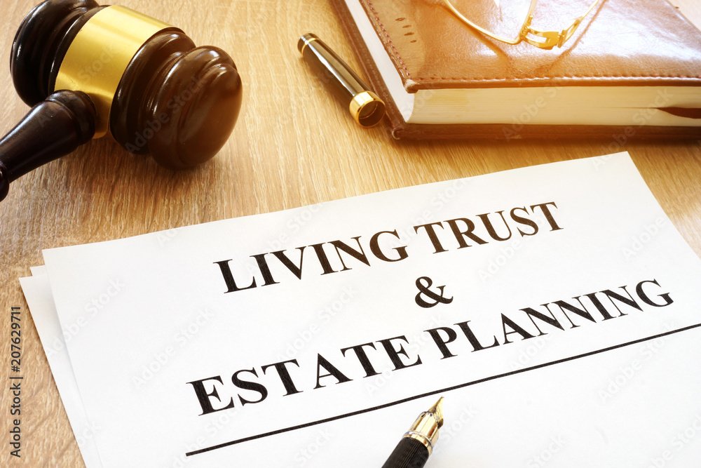 Living trust and estate planning form on a desk.